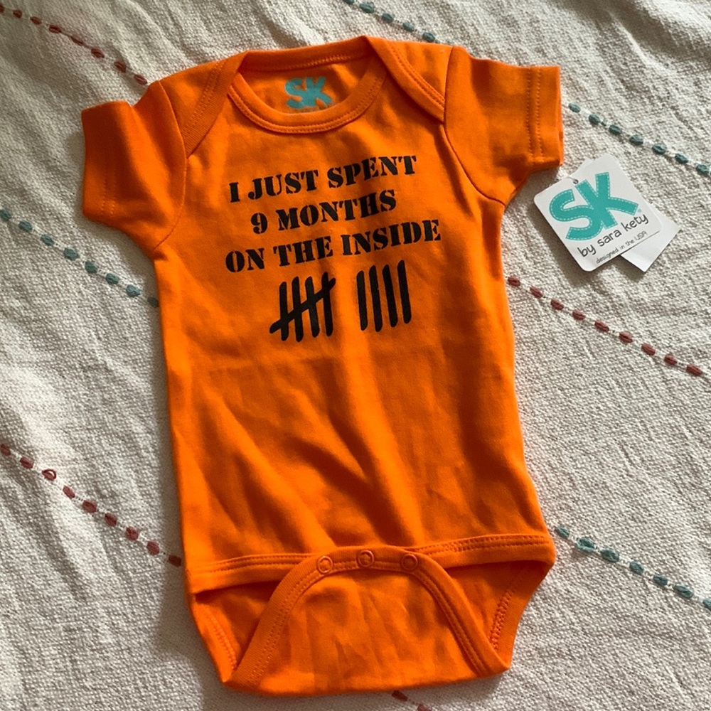 Sara kety unisex bodysuit